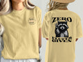 Yellow t-shirt with "Petty Little Things" on front and raccoon graphic with "Zero Fluffs Given" on back.
