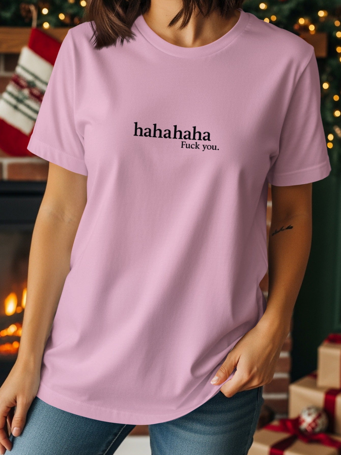 Pink t-shirt with black text that reads "hahahaha Fuck you."