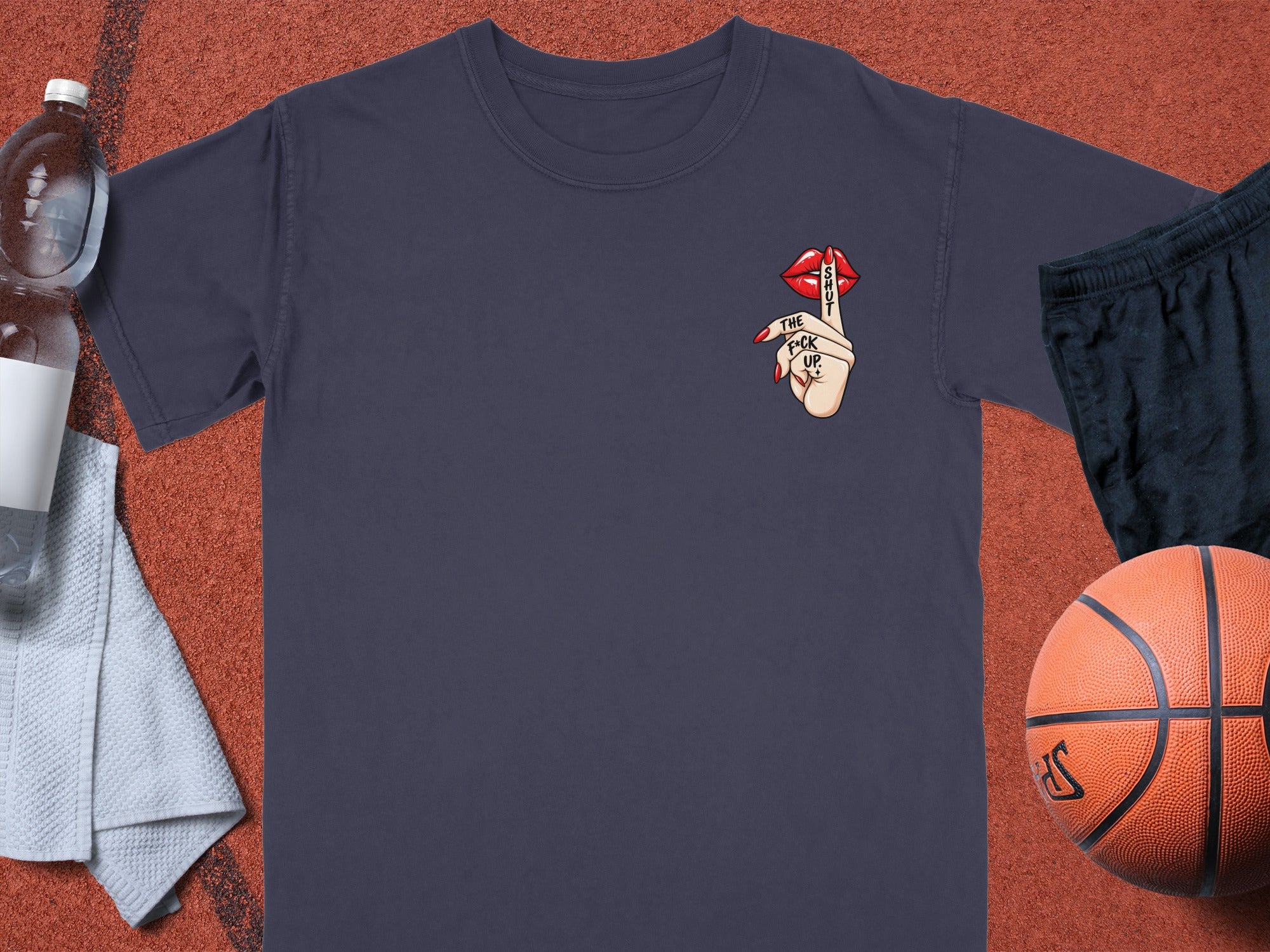 Navy t-shirt with a graphic of red lips and a finger over them saying "Shut the f*ck up".
