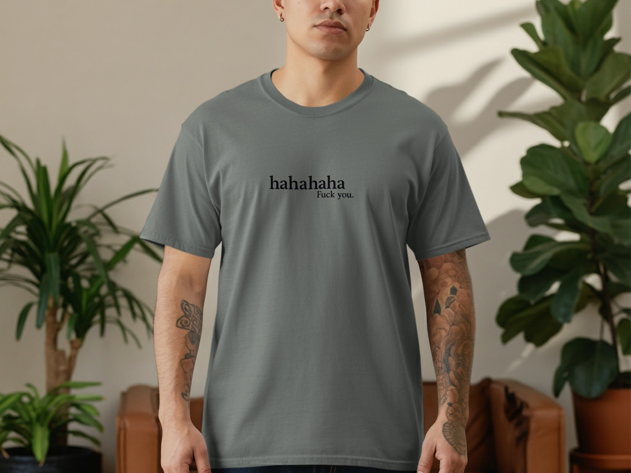 Grey t-shirt with "hahahaha Fuck you." text on chest.