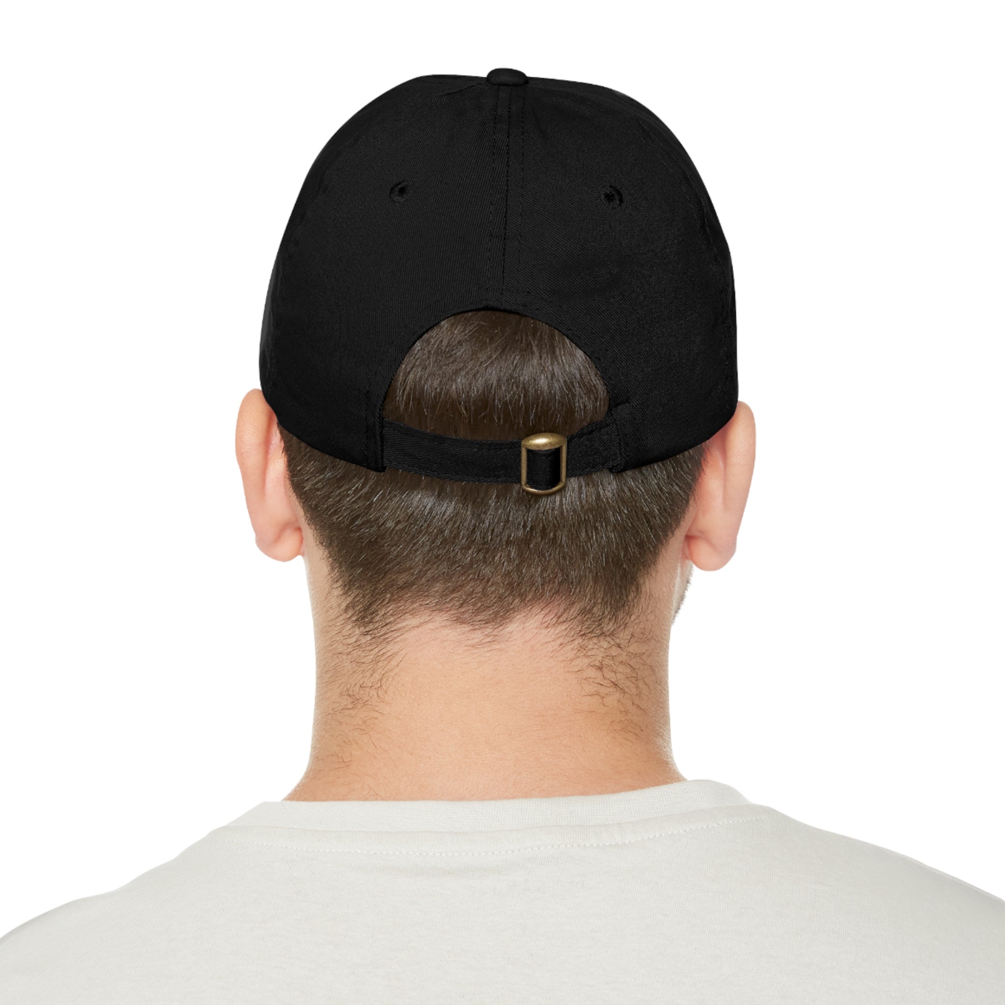 Back view of a black baseball cap with adjustable strap and brass buckle.