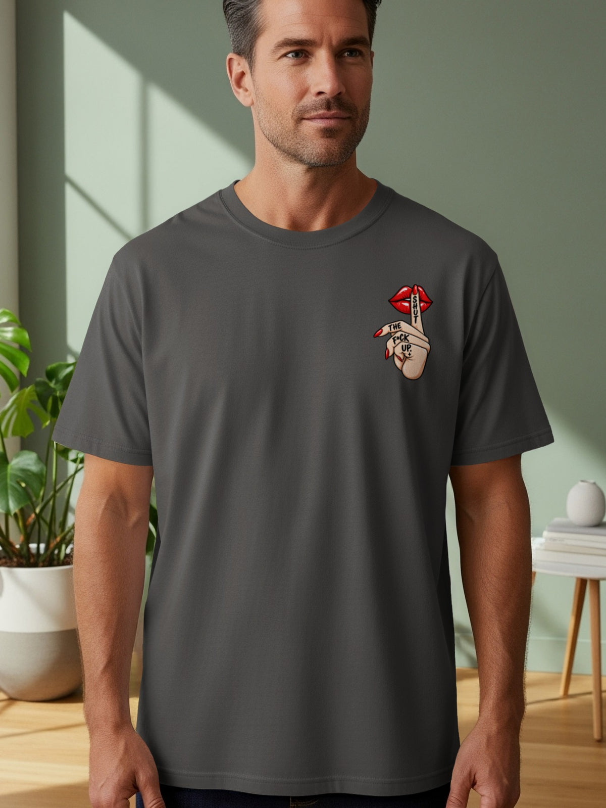 Gray t-shirt with red lips and "Shut the fuck up" graphic on chest.