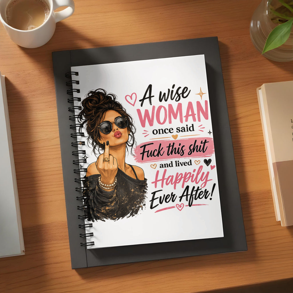 Notebook with illustration and text: "A wise woman once said: Fuck this shit and lived happily ever after!"