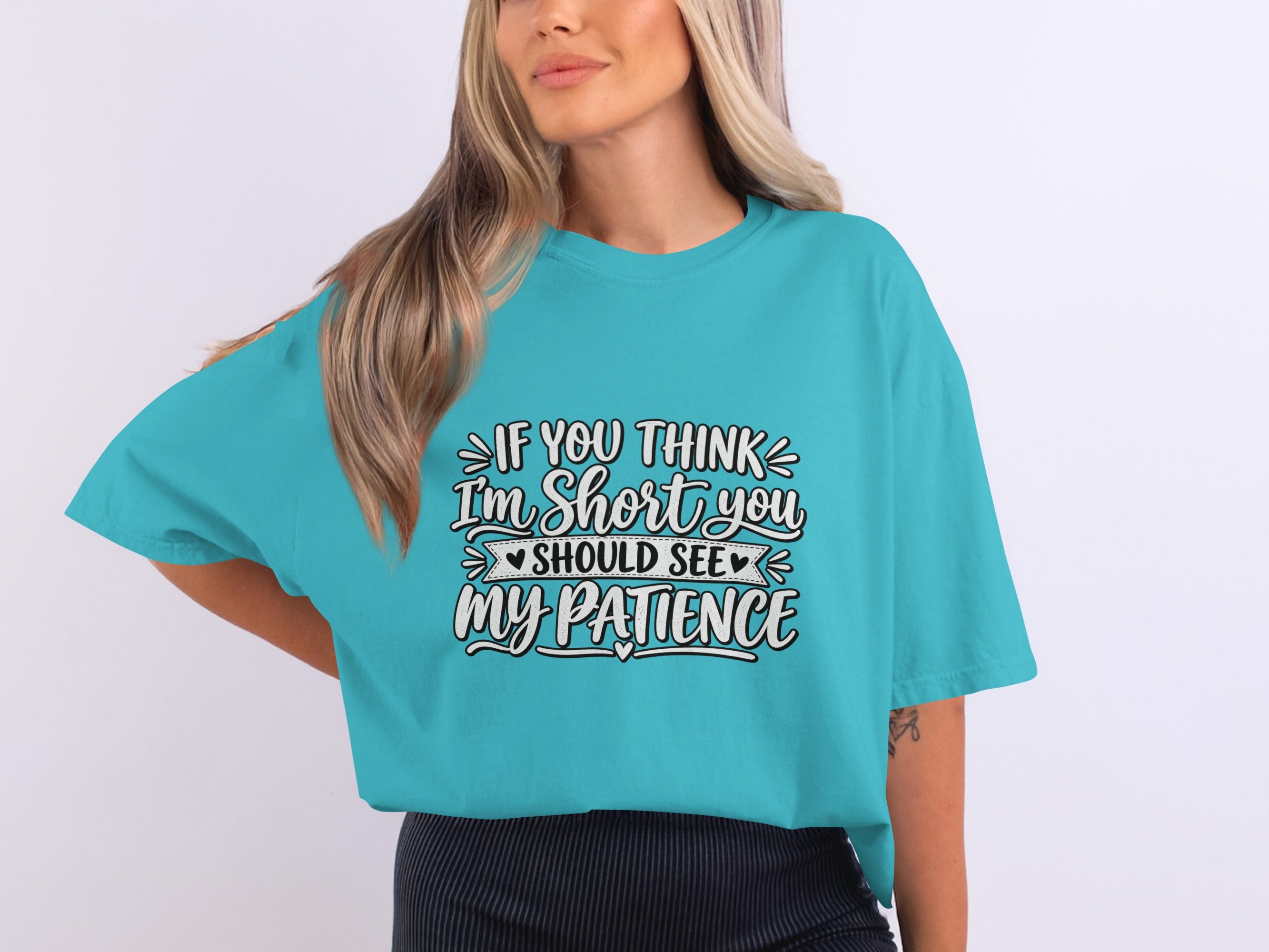 Teal t-shirt with text "If you think I'm short you should see my patience".