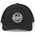 Black trucker hat with "Professional Asshole Available 24/7" text logo.