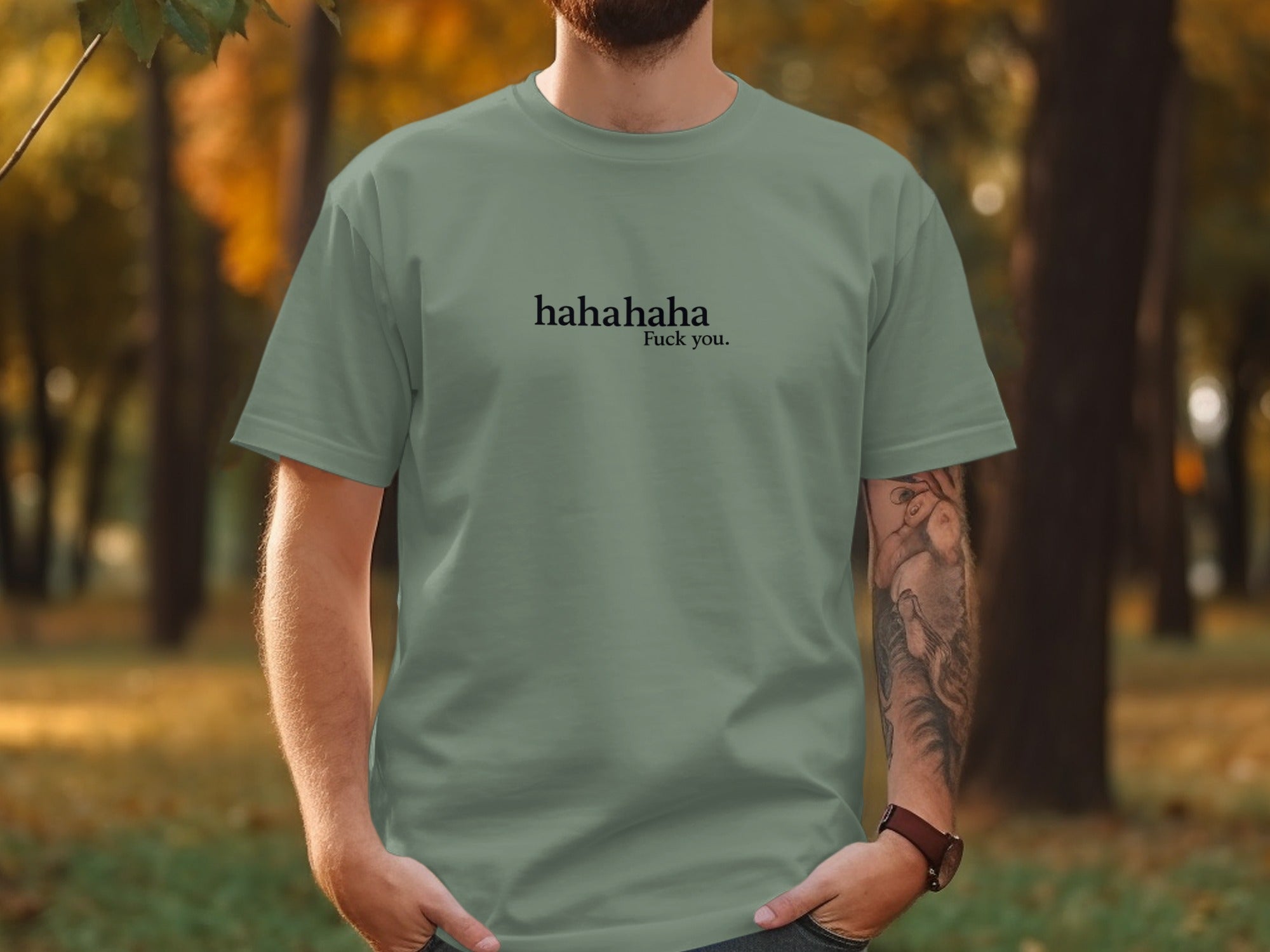 Light green t-shirt with "hahahaha Fuck you." text on chest.
