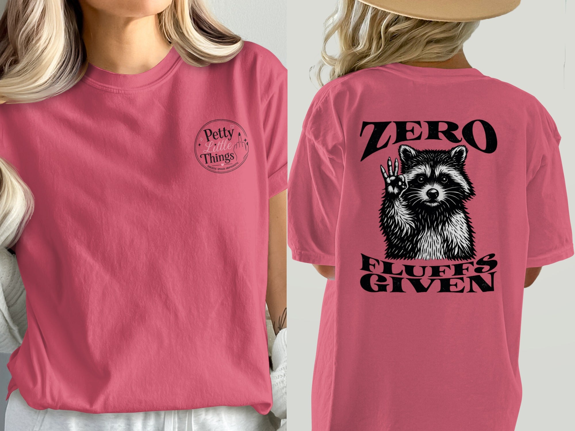 Pink t-shirt with "Petty Little Things" on front and raccoon graphic on back.