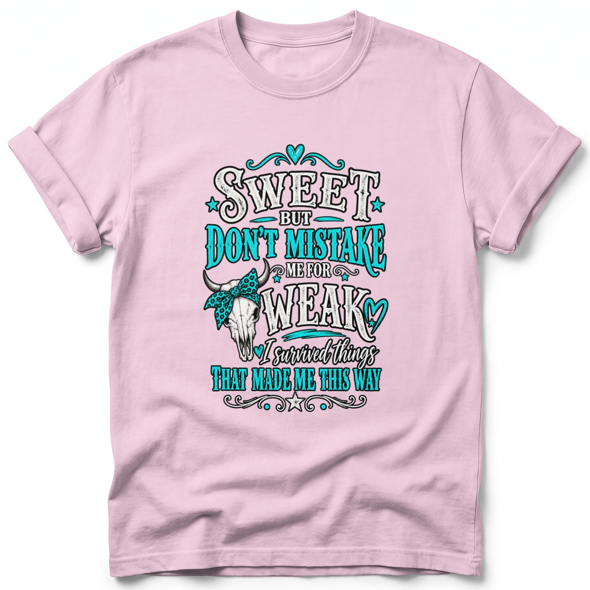 Pink t-shirt with "Sweet but don't mistake me for weak" graphic.