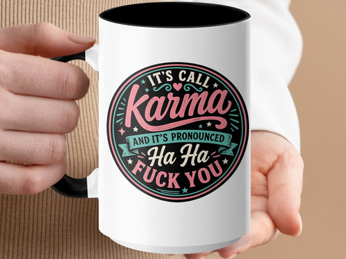 White mug with black interior featuring a circular design with text about karma.