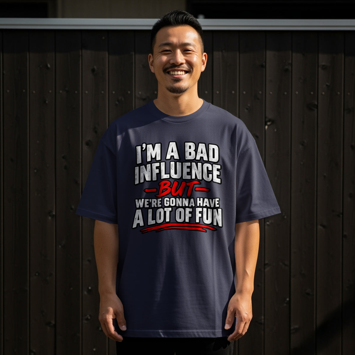 Navy t-shirt with text "I'm a bad influence but we're gonna have a lot of fun."