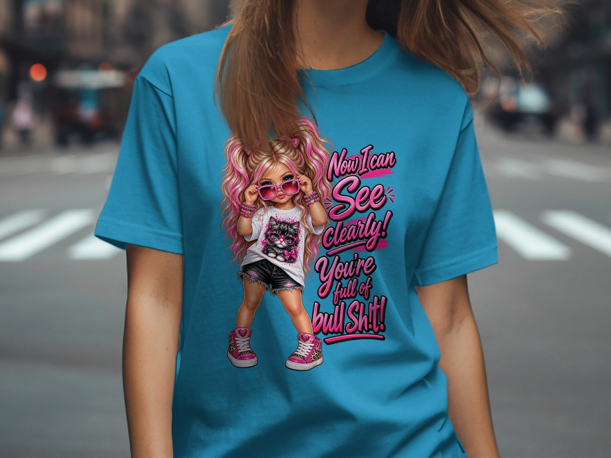 Blue t-shirt with a graphic of a girl and text saying "Now I can See Clearly! You're full of bull Shit!"