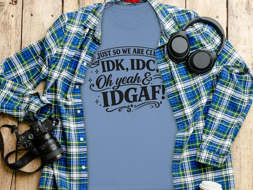 Blue t-shirt with black text: "IDK, IDC, Oh yeah & IDGAF!"