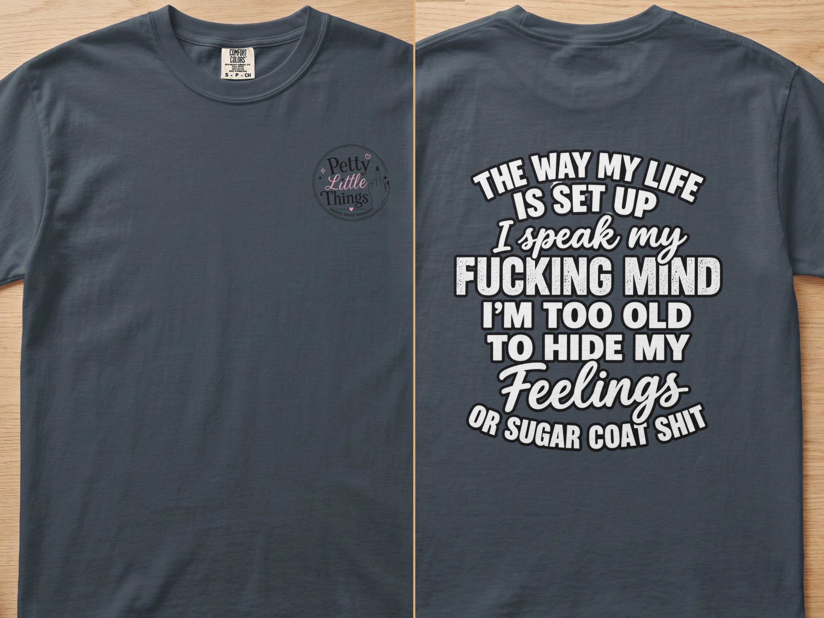 Dark grey t-shirt, front has "Petty Little Things" logo; back has "The way my life is set up..." quote.