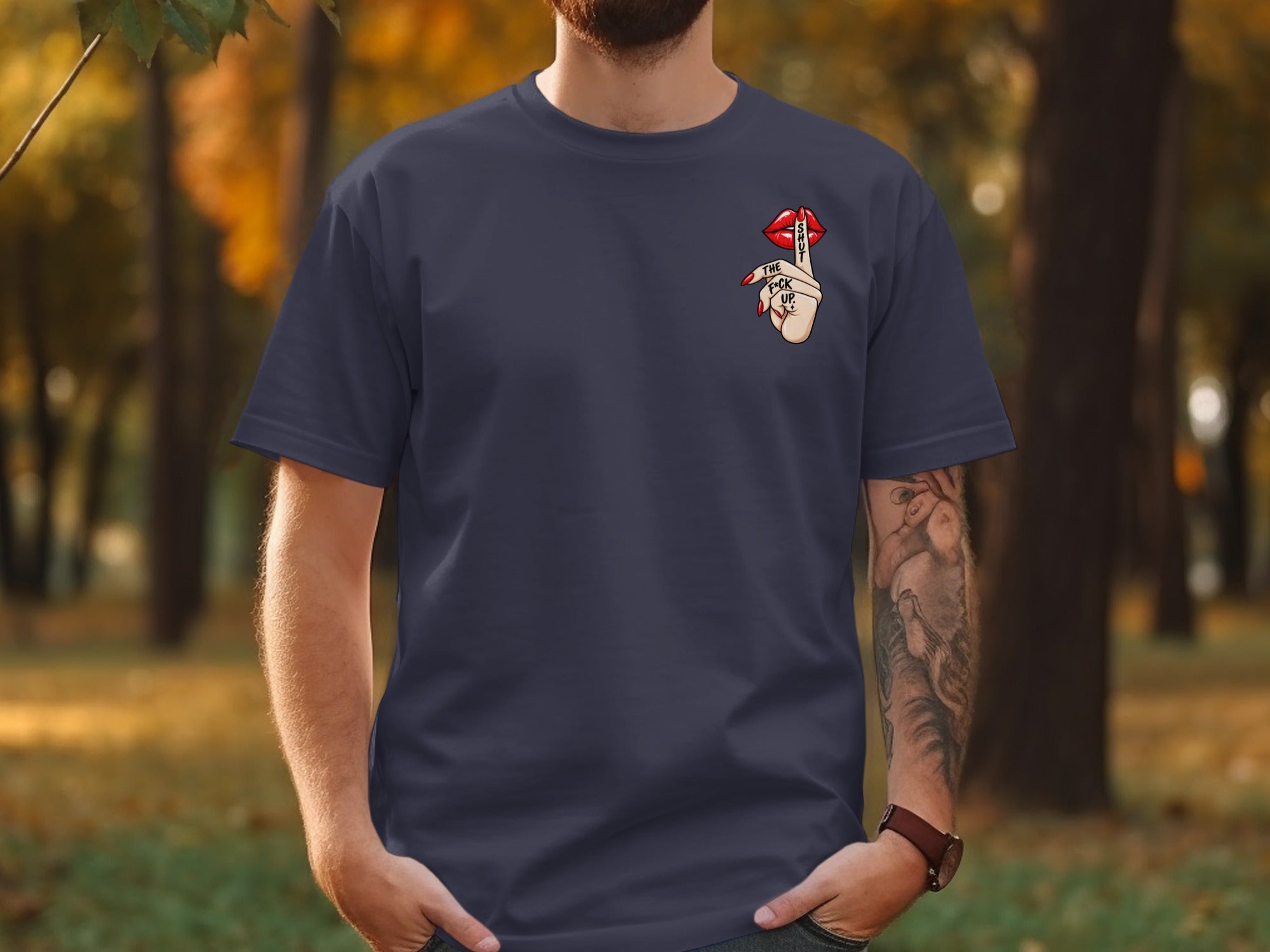 Dark blue t-shirt with a graphic of red lips and a finger to the lips with text.